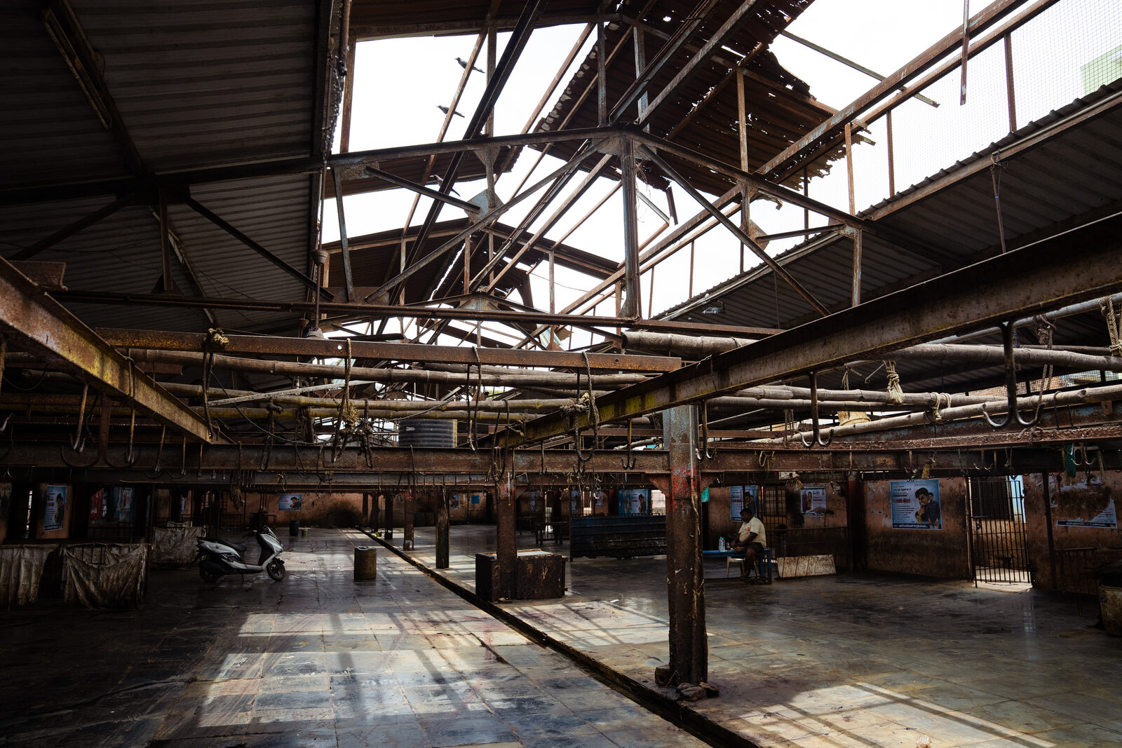 Damaged roof over the goat slaughter area.